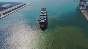 Aerial top video view containers ship cargo business commercial trade logistic and transportation of international import export by container freight cargo ship in the open seaport.