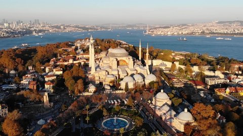 Drone shot of Hagia Sophia in Istanbul. Hagia Sophia Orthodox Cathedral in the historical center of modern Istanbul. Hagia Sophia Great Mosque. Four slender minarets. Ships sail along the Bosphorus. 