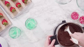 Time lapse. Flat lay. Step by step. Melting chocolate chips in chocolate melting pots.