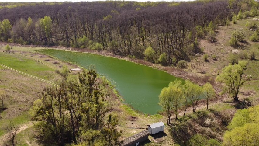 Small lake. The forest and the lake below