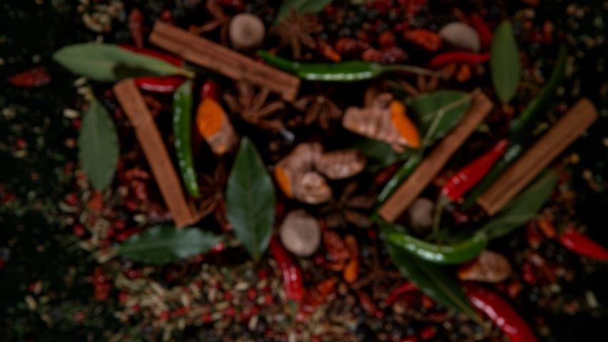 Super Slow Motion Shot of Flying Mix Spices. Isolated on Black Background. Filmed on high speed cinema camera, 1000fps. Royalty-Free Stock Footage #1084077217