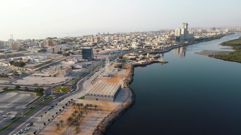 Hyperlapse of Ras al Khaimah emirate in the northern United Arab Emirates aerial skyline cityscape and skyline view above the corniche downtown area