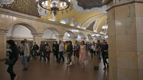 Moscow, Russia - September 10, 2019: People in the metro station Komsomolskaya of Moscow Metro. Located at Komsomolskaya square, the metro station is one of the busiest in Moscow Metro