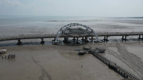hyperlapse of the suroboyo bridge which is located on kenjeran beach, Surabaya on Saturday 18 December 2021