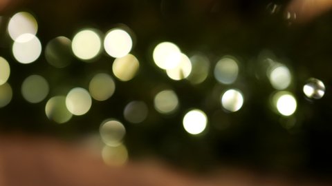 Fairy lights on a Christmas tree garland festive blurred bokeh abstract background