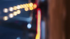 Vertical video bokeh blurred traffic jam on road in city in evening. Timelapse rush hour busy crossroad by bridge roadway downtown. Cars at night, lights in fast motion. Lights trails motion abstract - Powered by Shutterstock - Get 15% off with code: PIKWIZARD15