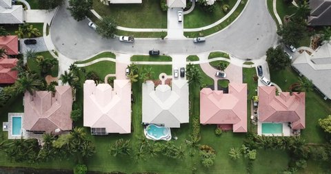 Cinematic Aerial Drone Footage Over South Florida Residential Neighborhood Showing Houses, Streets, and Landscaping