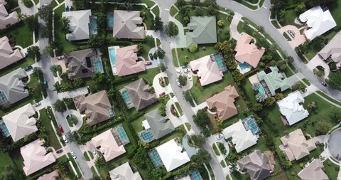 Cinematic Aerial Drone Footage Over South Florida Residential Neighborhood Showing Houses, Streets, and Landscaping