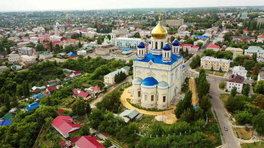 Aerial view of the Ascension Cathedral and residential areas on a summer day in Yelets Royalty-Free Stock Footage #1084133956