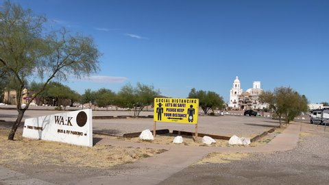 Tucson , Arizona , United States - 11 25 2021: Social distancing sign in parking lot of Tucson church