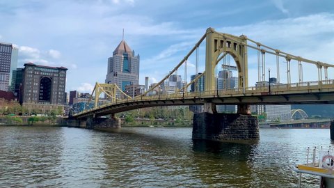 Pittsburgh , Pennsylvania , United States - 08 21 2021: Roberto Clemente Bridge on a sunny day with Highmark building in the background