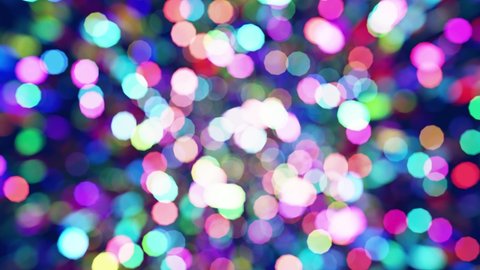 Realistic looping 3D animation of the shining colorful light particles circular bokeh rendered in UHD as perfect motion background