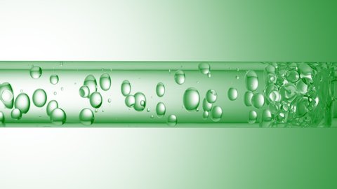 Macro shot of different sized clear bubbles flowing in glass tube with clear liquid on green background  Abstract body care cosmetics mixing concept