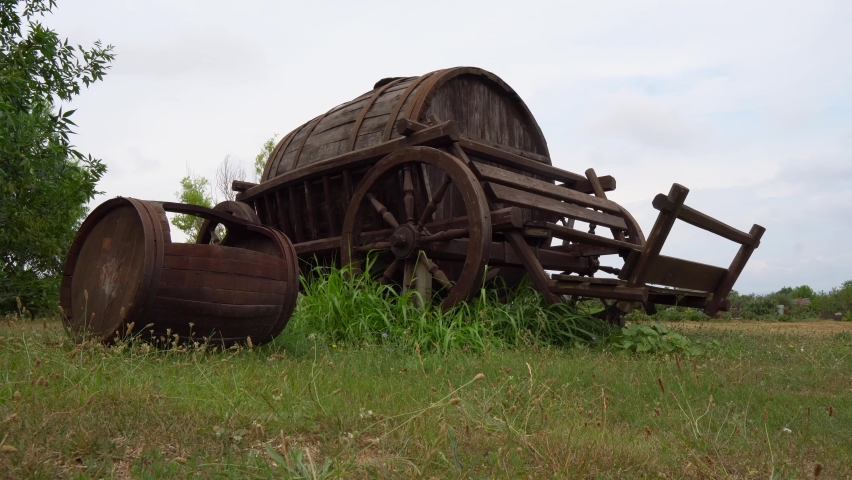 huge wooden barrel on wheels