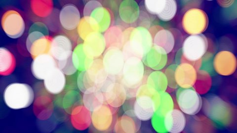 Realistic looping 3D animation of the shining colorful light particles bokeh rendered in UHD as perfect beautiful motion background