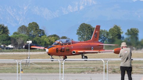 Rivolto del Friuli Italy SEPTEMBER, 17, 2021 Jet aircraft taxies during an airshow with people watching it. Aermacchi MB-326 by Volafenice