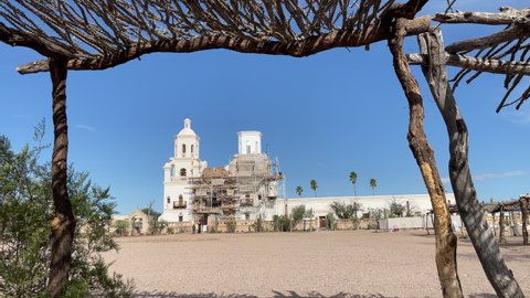 San Xavier Mission in Tucson, Arizona. Scaffolding around one tower, hand-held