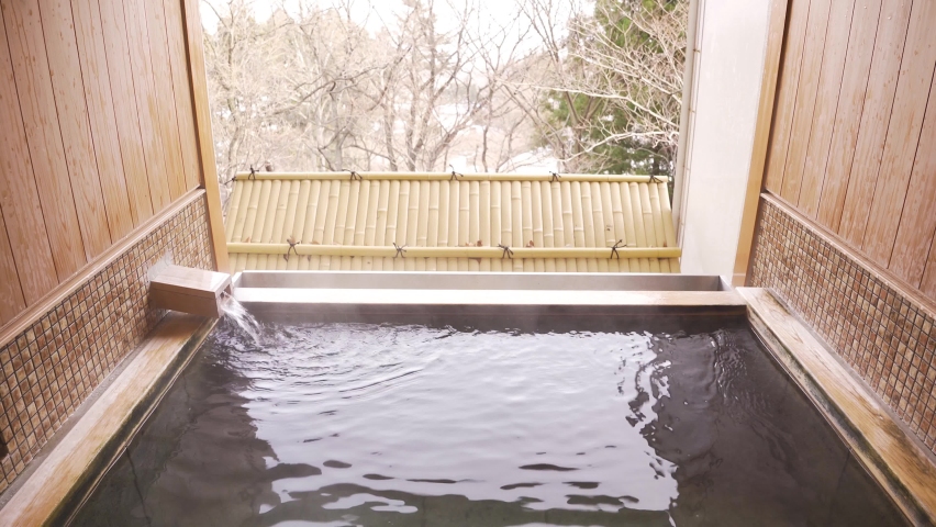 Hot spring in a room with an open-air bath