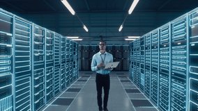 Futuristic Animated Concept: Big Data Center Chief Technology Officer Using Laptop Standing In Warehouse, Activates Servers, Information Digitalization Starts. SAAS, Cloud Computing, Web Service - Powered by Shutterstock - Get 15% off with code: PIKWIZARD15