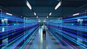 Futuristic Animated Concept: Big Data Center Chief Technology Officer Using Laptop Standing In Warehouse, Information Digitalization Lines Streaming Through Servers. SAAS, Cloud Computing, Web Service - Powered by Shutterstock - Get 15% off with code: PIKWIZARD15