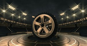 Virtual race stadium with rotating car tire floating in the air. Two time looped 4k video parts as golden and blue variant. Virtual studio background animation.