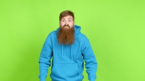 Redhead man with long beard pleading over isolated background
