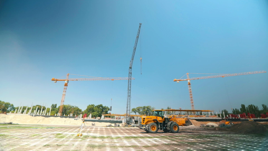 Time laps construction site. Bulldozer at a construction site. A bulldozer levels the soil layer at a construction site. Animated mesh.