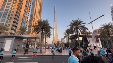 Dubai , United Arab Emirates - 11 26 2021: Dubai Run 2021 At Longest Sheikh Zayed Road With Famous Burj Khalifa