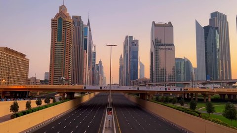 Dubai , United Arab Emirates - 11 26 2021: Empty Sheikh Zayed Road in Dubai With Skyscrapers 