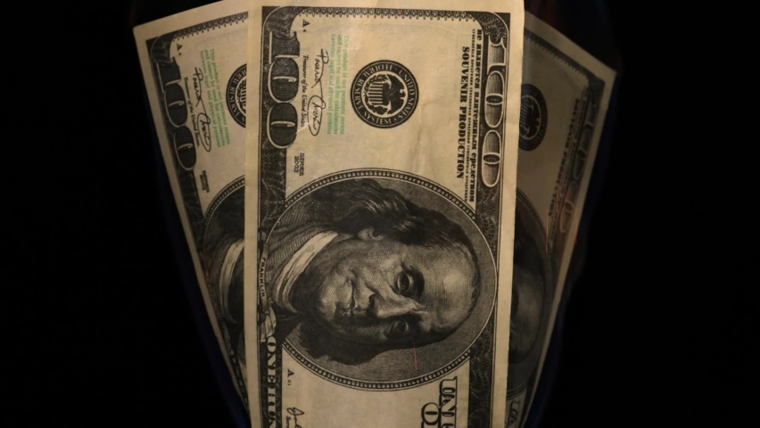 USA dollar bill money is burning in the fire, the concept of the economic crisis of inflation and currency devaluation. Royalty-Free Stock Footage #1084258264