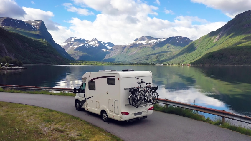 Family vacation travel RV, holiday trip in motorhome, Caravan car Vacation. Beautiful Nature Norway natural landscape. Royalty-Free Stock Footage #1084258318