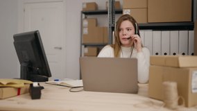 Young blonde woman call center agent working at office