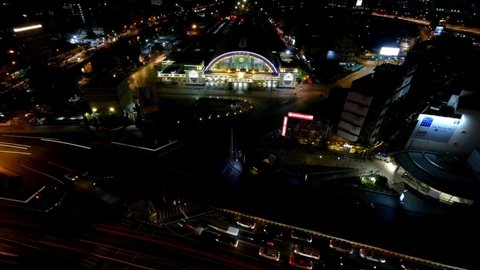 Bangkok, Thailand. December 2, 2021.
Top view of Rama 4 road with cross junction at the front of Hua Lamphong station at night