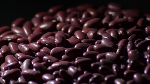 Red beans legumes turning with a intimate light