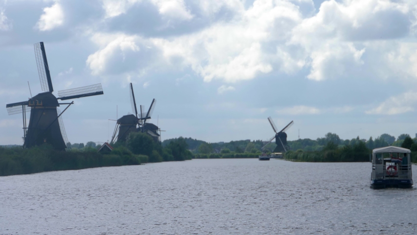 Windmills on a cloudy day in the netherlands 