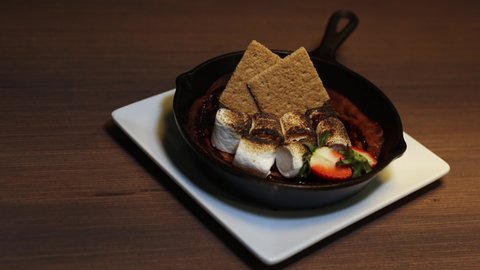 Sweet and Delicious Marshmallow and Graham Cracker Dessert in Iron Skillet
