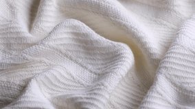 soft white embossed striped fabric or plaid close-up fabric structure rotation background