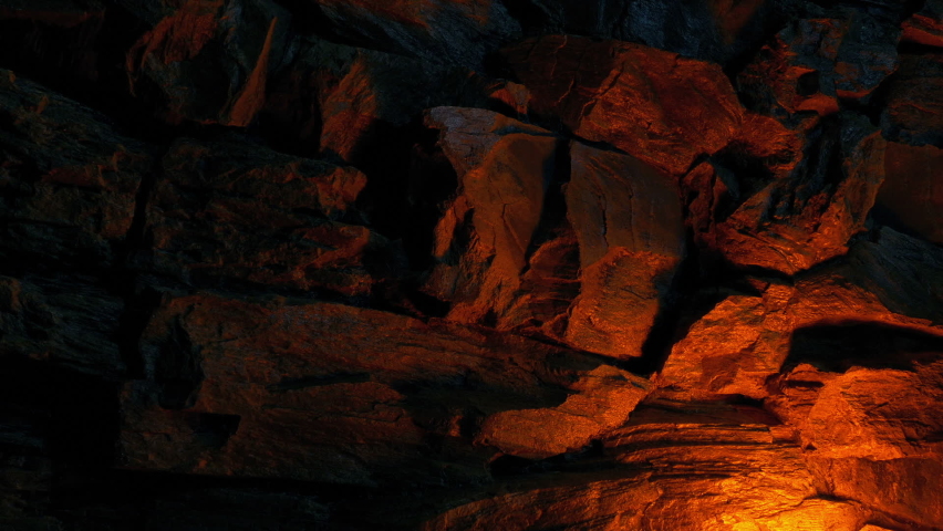 Fire Glow On Cave Wall Royalty-Free Stock Footage #1084286245