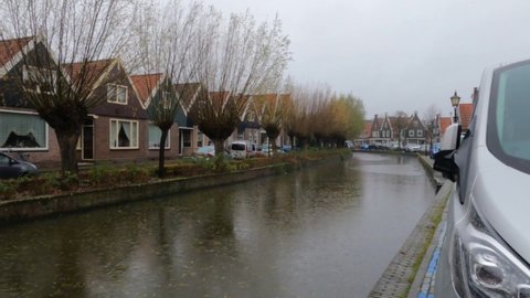 Volendam Holland Netherlands on December 12, 2021 houses next to the canal in the fishing village