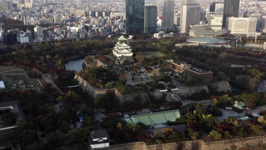 Aerial view of Osaka castle in Osaka, Japan. Skyscrapers in the background