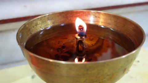 Jammu, India 5th December 2021: A close-up upshot of Diya which is used in Indian religions pooja and rituals. 