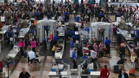 DENVER, COLORADO/USA - MARCH 1, 2015: Wide establishing TSA lines at Denver International Airport. Shot with PANASONIC FZ1000 in 4K Ultra HD.