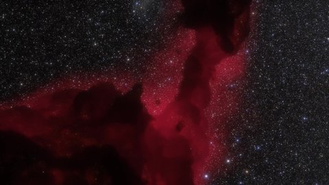 Spaceship travelling at the speed of light through a red nebula in space. 3d animation