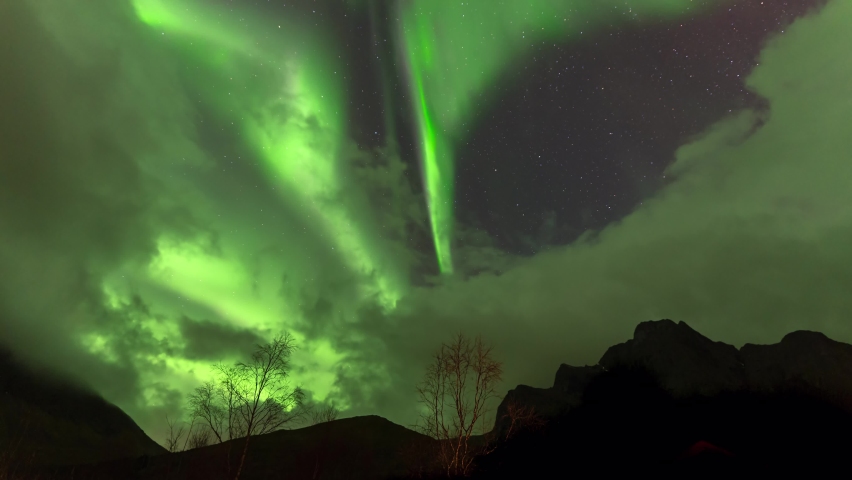 Timelapse northern lights in Norway, colorful aurora borealis (northern lights) | Shutterstock HD Video #1084359364