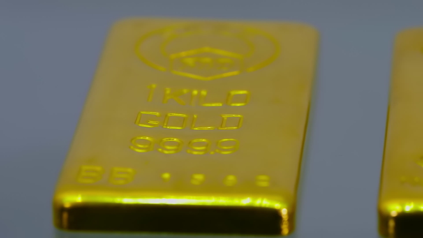 Close Up. Row Of Valuable Refined Gold Bars Made Of Precious Metals. Shiny Gold Bullion Bars Manufactured For Bank. Finished Production Of Gold Ingot Bars With Different Weight. Finance. Business Royalty-Free Stock Footage #1084362208
