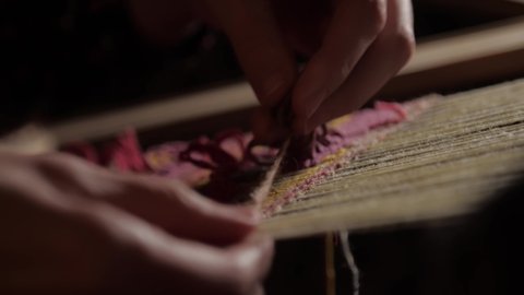 Handmade tapestry in slow motion Stockvideó