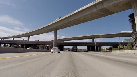 LOS ANGELES, CALIFORNIA, USA - July 10, 2015:  San Diego 405 Freeway south and 105 Freeway Interchange near LAX in Los Angeles.