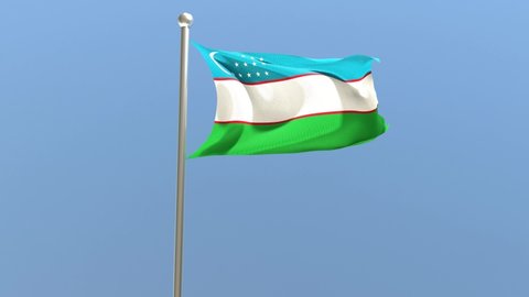 Uzbek flag on flagpole. Uzbekistan flag fluttering in the wind.