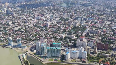 Krasnodar, Russia. New residential buildings on the Kubanskaya embankment. The Kuban River. Flight over the city in summer, Aerial View Hyperlapse