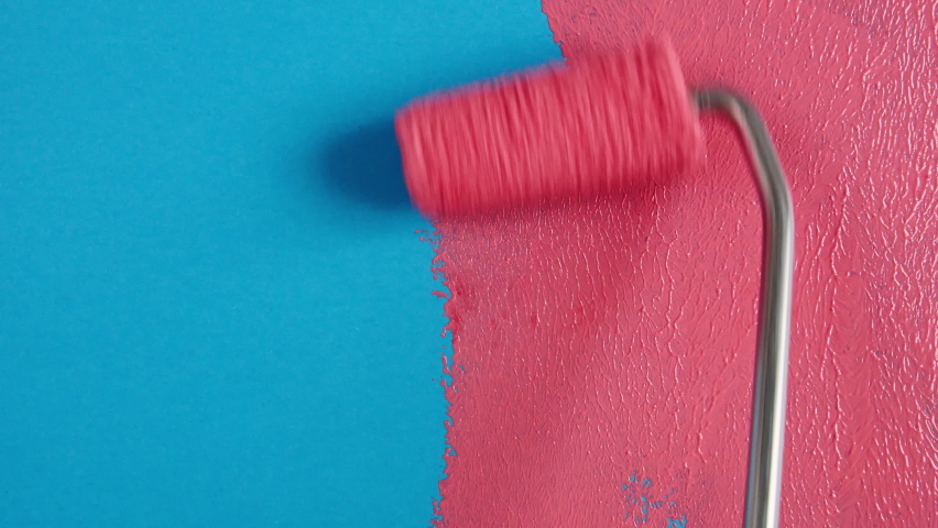 Abstract brushstrokes of pink paint brush applied isolated on a blue background. Pink paint smear texture. Pink sparkling textured artistic illustration. Smears of cosmetics. | Shutterstock HD Video #1084415002